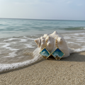Pendientes artesanales inspirados en el mar 🌊

✔ Diseño único con esencia marina  
✔ Hechos a mano con detalle y cuidado  
✔ Tonos azules que recuerdan al océano  
✔ Ligeros y cómodos para todo el día  
✔ Cada pieza es especial y diferente 💎  

✨ Lleva
